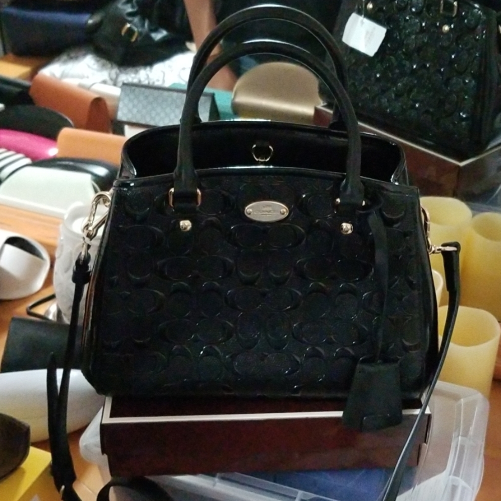 Black and gold Coach purse